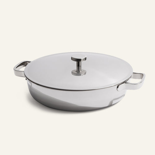 Titanium Braiser Pro 28 cm with lid and dual side handles, made of stainless steel, displayed on a plain light background.