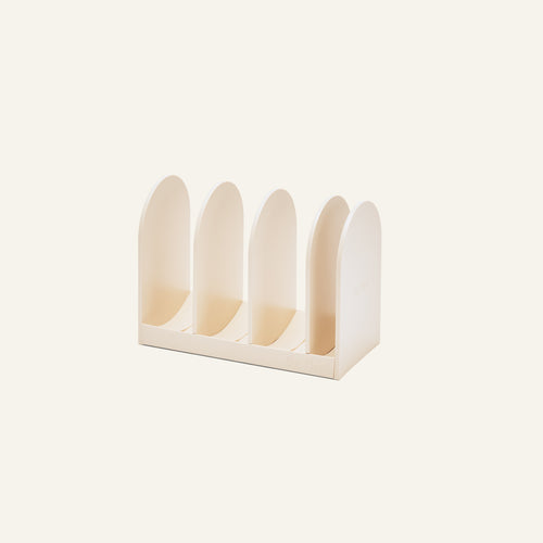 Universal Storage: A beige organizer with four upright rounded dividers on a rectangular base—perfect for paperwork, cookware, or Wonder Oven storage.
