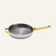 Titanium Always Pan Pro 26 cm, a silver-toned skillet with a textured interior and gold-toned handles.