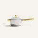 Titanium Perfect Pot Pro 3 L white lidded saucepan with gold-colored handles and lid knob.