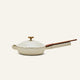 The Ceramic Nonstick Always Pan 20 cm features a cream-colored finish, a long wooden handle, and a matching lid; this multifunctional nonstick pan is designed for easy cooking and is displayed against a plain light background.